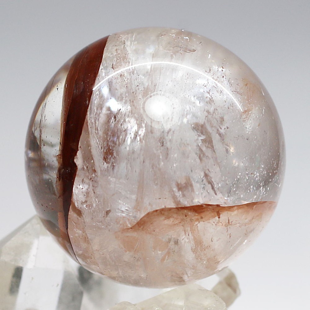 マニカラン産]ヒマラヤ水晶丸玉/スフィア（赤褐色・透明系）(MNHC-SPHE651IS) | 天然石・パワーストーン Infonix（インフォニック）