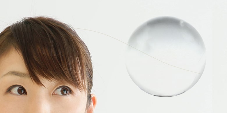 髪の毛を使った水晶玉の見分け方イメージ